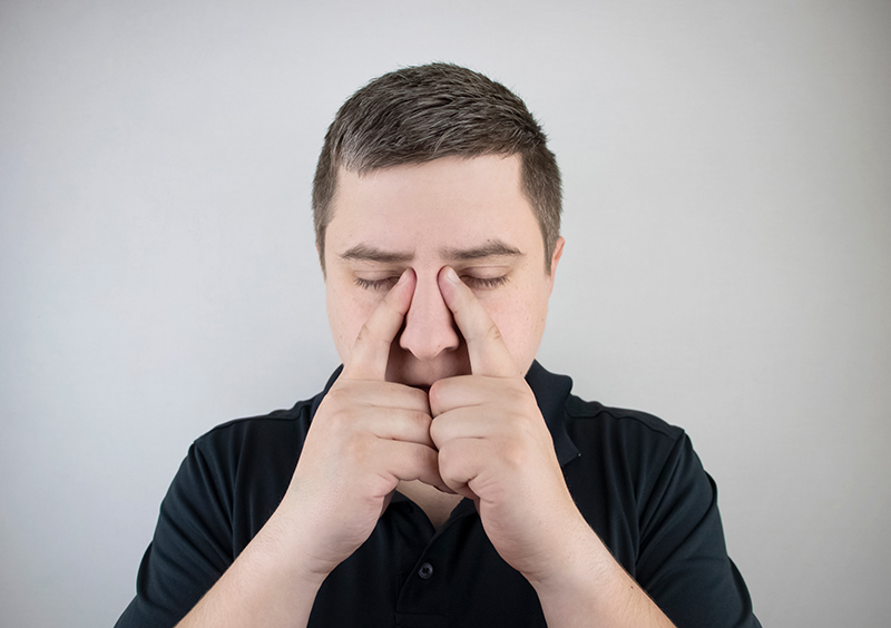 Male patient with ethmoiditis, considering sinus infection surgery.